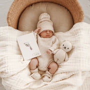 Newborn with inkless footprint milestone card