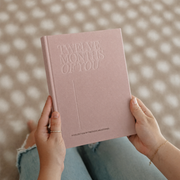 Blush keepsake album held in hands